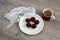 Dark Chocolate bitter truffles and a cup of coffee, closeup