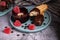 Dark chocolate coated digestive biscuit with red velvet cake and heart shaped candies for loved ones celebration. Partially eaten