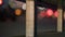 Dark city highway guardrail iron beam closeup. Metallic part reflect headlights