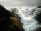 Dark cliffs on coast of Indian ocean