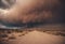 a dark cloud over a dirt road in the desert, with some bushes and weeds