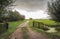 Dark clouds above Dutch polder landscape