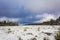 Dark clouds above fir trees landscape Brocken mountain Harz Germany