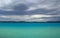 Dark Clouds hovering Emerald Surface of Lake Pukaki