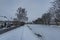 Dark cloudy street in Telc town in winter cold morning