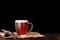 dark cold beer in a frosty mug on dark wooden table