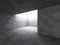 Dark concrete basement room with light hole window