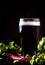 Dark english beer, ale or stout is poured into glass, dark bar c