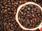 Dark espresso roasted coffee beans macro view