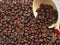 Dark espresso roasted coffee beans macro view