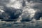 Dark evening sky with large heap clouds.