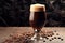 dark, full-bodied stout craft beer in a chilled glass