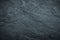 Dark gloomy background texture. Abstract grunge rough peeled painted surface