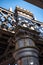 Dark and gloomy industrial atmosphere under the historical rail bridges in Manchester subway symmetry sun rays day summer blue sky