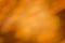 Dark golden gradient background with spotlight