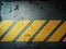 Dark Gray Grunge steel floor plate yellow line