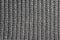 Dark gray knitting texture background or knitted pattern background.