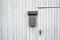 Dark-gray mailbox on a light gray wooden gate of a farm in Wittenberg Krofdorf-Gleiberg