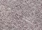 Dark gray unprinted suiting fabric from above .Cloth texture