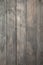 Dark gray wooden floor, vertical background