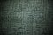 Dark green carpet fabric pattern background