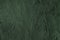 dark green colored low contrast Concrete textured background with roughness and irregularities