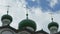 Dark green domes with crosses of Orthodox Church