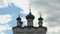 Dark green domes with crosses of Orthodox Church