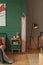 Dark green and grey design of contemporary teenager`s room