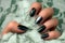 Dark green nails manicure