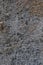 Dark Grey Coarse Concrete Stone Wall Texture, Vertical Macro Closeup Old Aged Weathered Detailed Natural Gray Rustic Textured