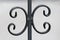 Dark grey wrought iron vintage retro decorative custom made ornament made as part of suburban family house backyard doors