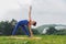 Dark-haired woman standing in standard yoga pose