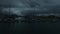 Dark, harbor and boats at sea for travel, vacation or adventure at night. Evening, water and landscape or aerial view of