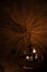 dark interior vertical picture with lights and shadows from chandelier object warm atmospheric background indoor view