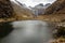 Dark lagoon in Huascaran mountains, on Huaraz