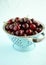 Dark lapin cherries vintage colander