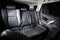 Dark luxury new car Interior. Back passenger seats in modern car. Leather backseats and seatbelts