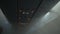 Dark Man Silhouette in Airplane Passenger Cabin Full with Fog