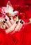 Dark manicure and red and white lilies