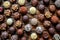 Dark, milk and white chocolate candies, pralines, truffles on wooden table