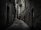 A dark and moody back alley taken in the historic town of  Recanati, Macerata, Marche, Italy