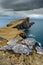 Dark and moody clouds over Neist Point on the Isle of Skye in the Scottish Highlands.