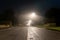 A dark moody street going into the distance on a foggy winters night. In an English town. Worcester