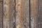 Dark natural wooden background. Old wooden wall with cracks and nails. Wood texture