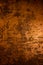 Dark old scary rusty rough golden and copper metal surface texture/background for Halloween or haunted house games