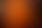 Dark orange background gradient. brown blurred background