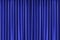 Dark pattern blue vertical curtain.