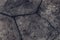 Dark patterned stone surface