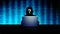 Dark person with hood silhouetted against open laptop